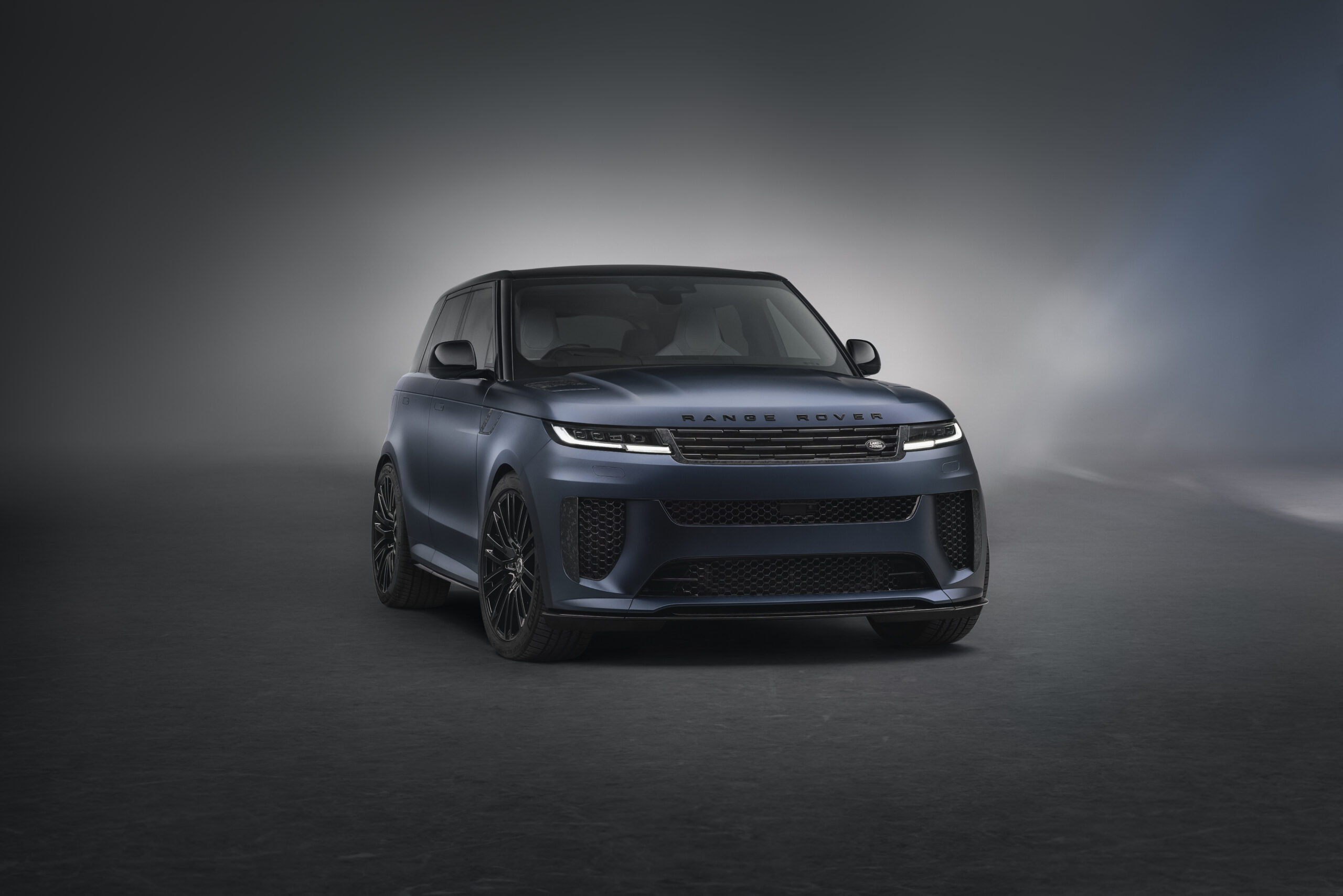 Front view of the Range Rover Sport SV Edition Two in matte blue, showcasing sleek LED headlights and bold grille.